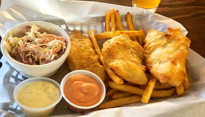 Fried fish and chips basket, served with French fries, coleslaw, and tartar sauce at Magic Valley brewing in Idaho